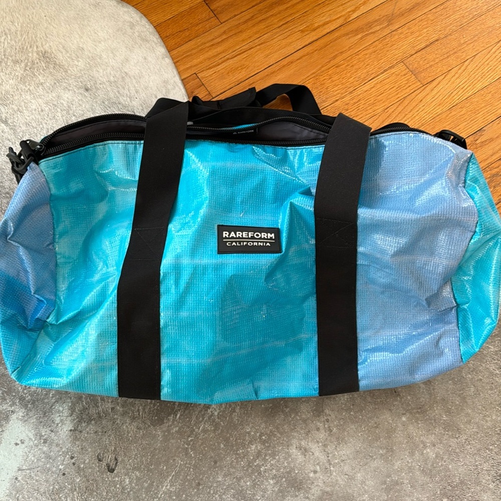 Reform duffle bag used once aqua blue with longer shoulder strap
